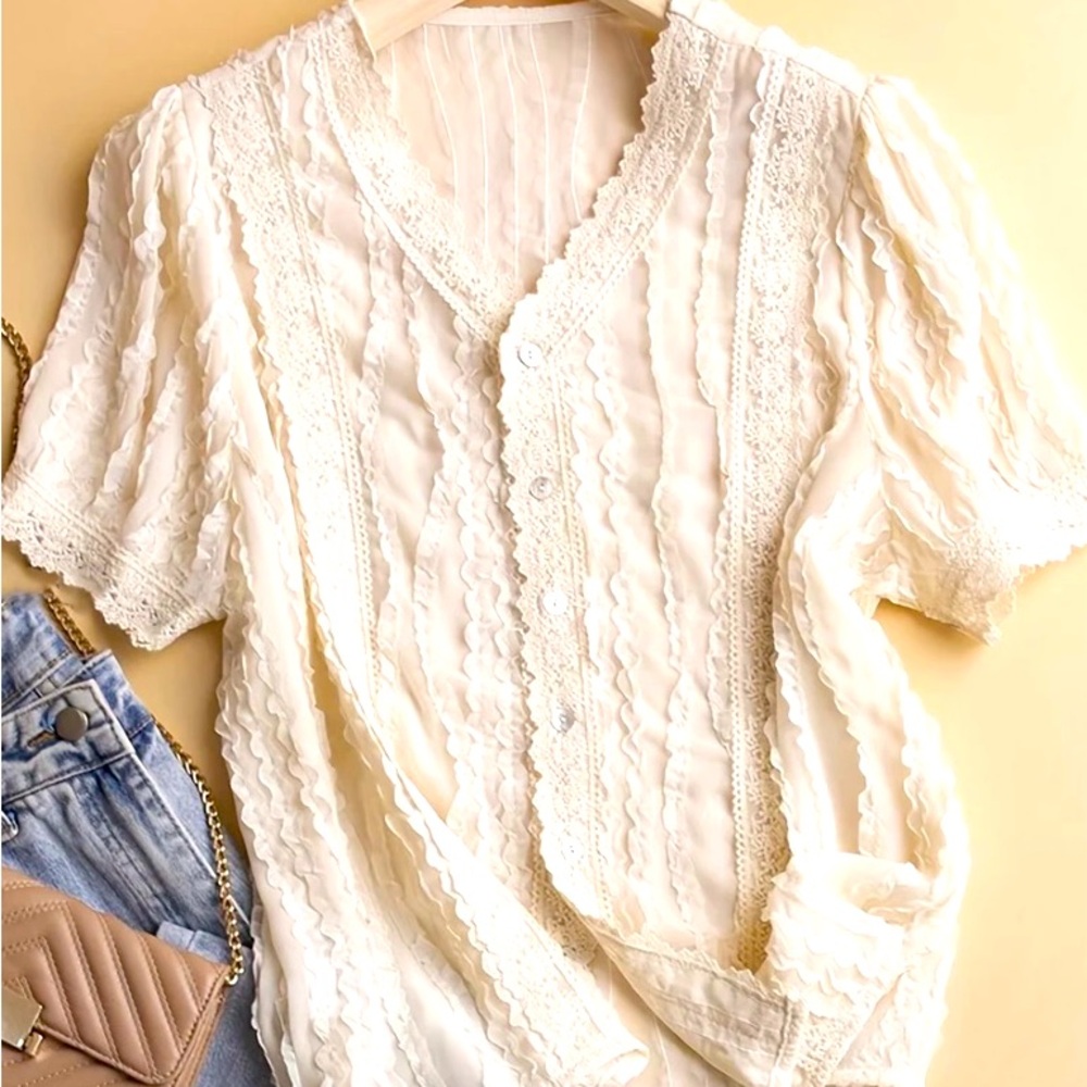 Sheer lace and crochet button up shirt. Brand New!